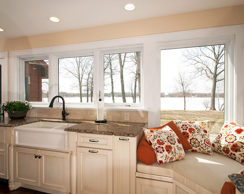 Kitchen design and window seat by Kitchens by Design